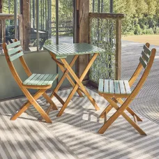 sweeek - Acacia wood garden table 2 folding chairs Hilora Sage Green 60x60x8 cm