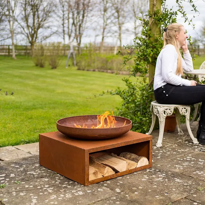 Tierra Fire Pit Bowl & Log Store Weatherproof Oxidised Metal Outdoor Garden Wood Burner Rust-Effect Finish Integral Storage 64cm