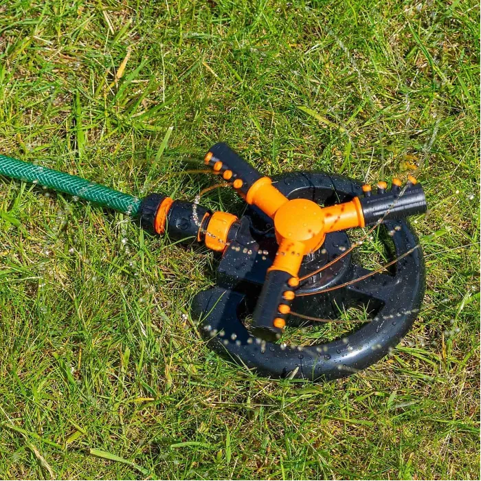Orange 3-Arm Rotating Lawn Sprinkler - Quick Click Connection, Adjustable Spray, Sturdy Base for Easy Watering