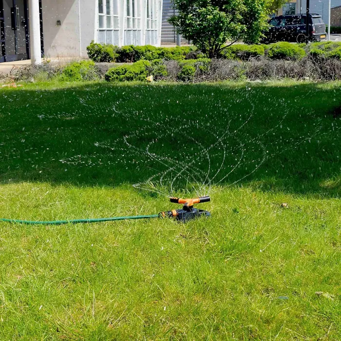 Orange 3-Arm Rotating Lawn Sprinkler - Quick Click Connection, Adjustable Spray, Sturdy Base for Easy Watering
